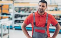 Factory worker in uniform representing the value of collaborators and stable employment