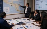 Hyperrealistic editorial scene of a Central American business strategy room with large regional maps, cross-border logistics routes, printed financial reports and executives reviewing expansion plans. Clean modern atmosphere, subtle Central American context, sophisticated corporate realism. NO stock-photo handshake, NO futuristic holograms, NO skyscraper skyline overload, NO coffee cups as focal point.
